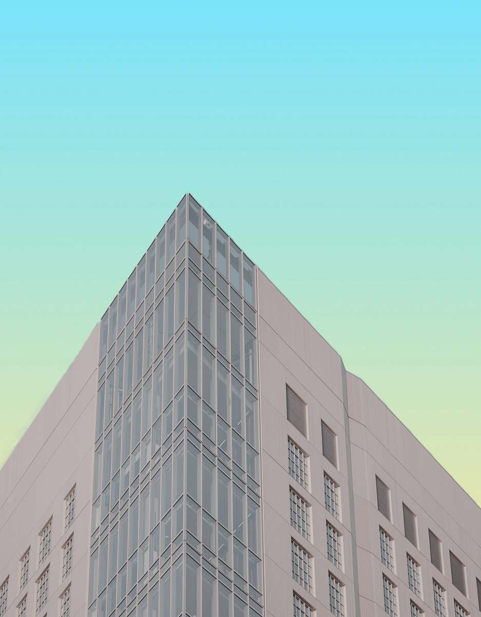 office building white and gray concrete building corner